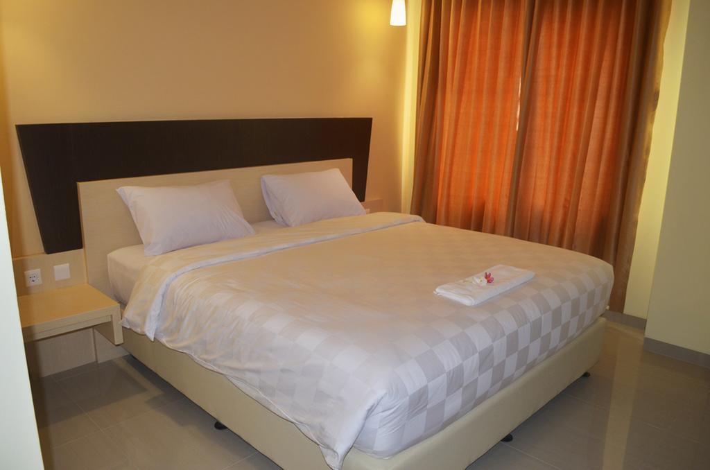M Hotel Mataram Rum bild