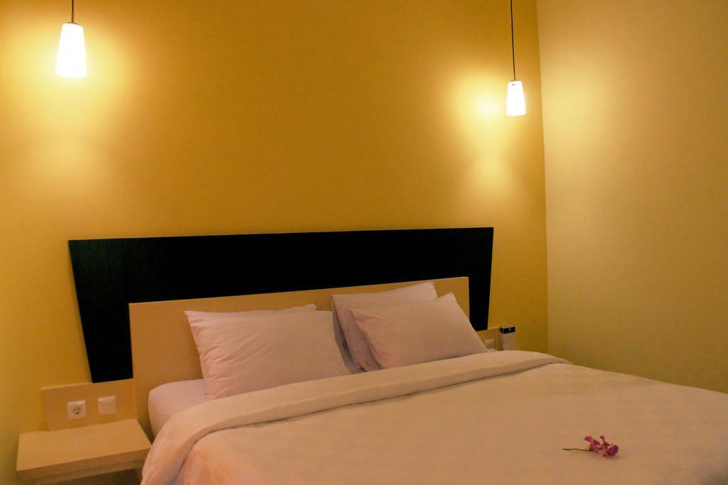 M Hotel Mataram Rum bild