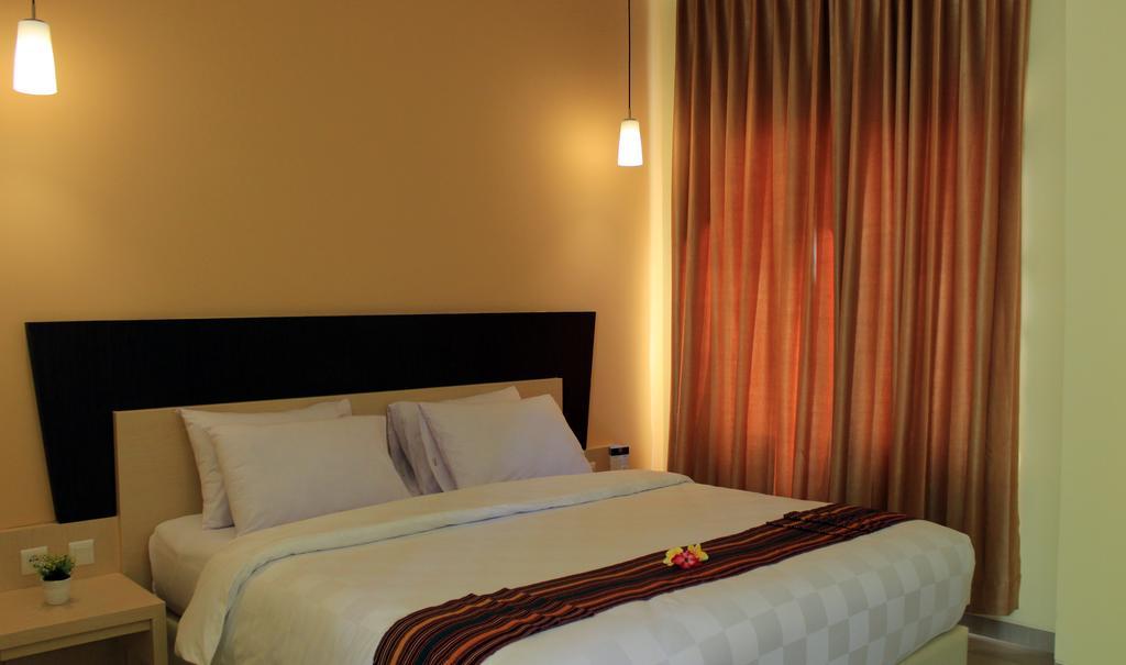 M Hotel Mataram Rum bild