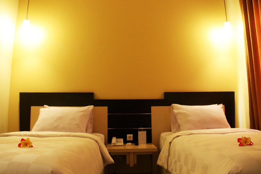 M Hotel Mataram Rum bild