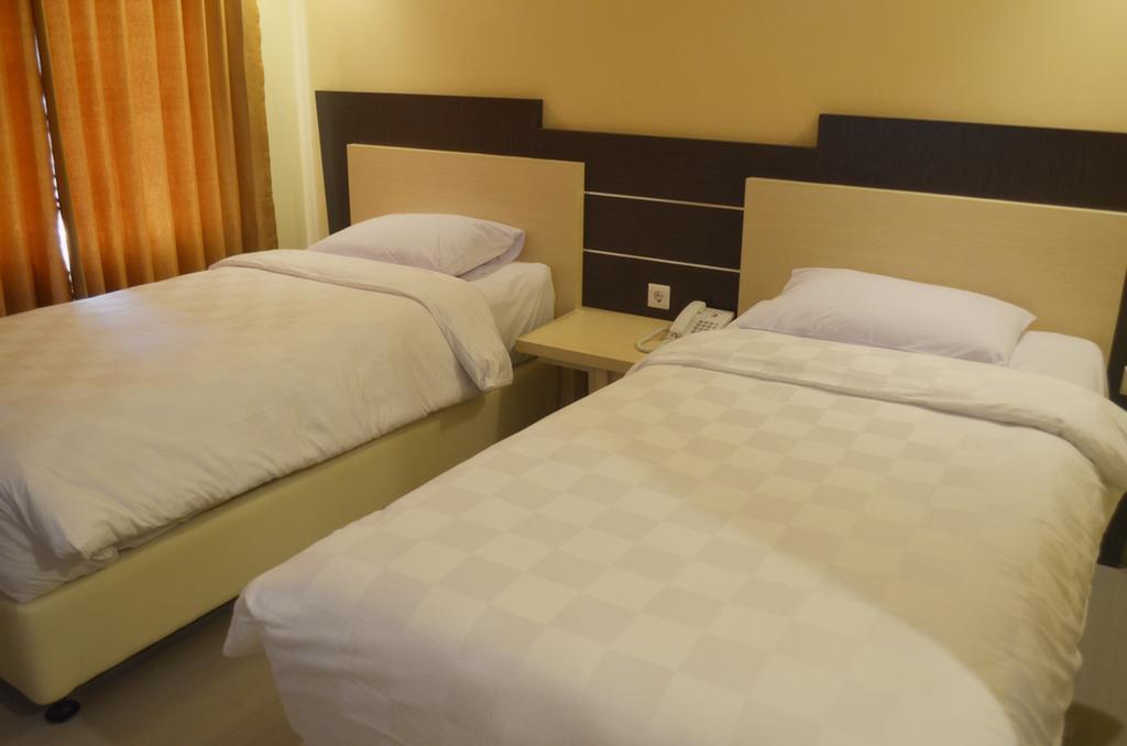 M Hotel Mataram Rum bild
