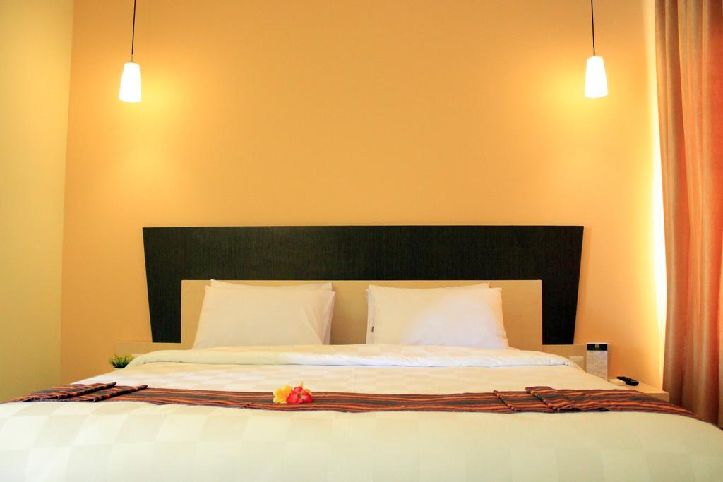 M Hotel Mataram Rum bild